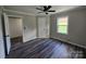 Spacious bedroom with hardwood floors, ceiling fan, and ample closet space at 416 Witten Ln, Gastonia, NC 28052