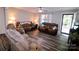 Open living room featuring hardwood floors and comfortable seating at 416 Witten Ln, Gastonia, NC 28052