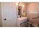 Bathroom with white vanity, large mirror, and walk-in shower at 416 Witten Ln, Gastonia, NC 28052