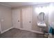 Small bathroom with pedestal sink and grab bars at 416 Witten Ln, Gastonia, NC 28052