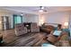 Bright living room with hardwood floors, open layout, and access to kitchen at 416 Witten Ln, Gastonia, NC 28052