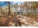 House exterior showcasing gray siding and gravel driveway at 850 Mereva Rd, Smyrna, SC 29743