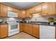 Modern kitchen with wood cabinets and appliances at 2222 15Th Ne Ave # 505, Hickory, NC 28601