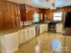 Kitchen with granite countertops, stainless steel appliances, and wood cabinets at 8092 Riverview Rd, Norwood, NC 28128