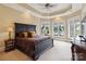 Spacious main bedroom with water views and luxurious features at 17813 Spinnakers Reach Dr, Cornelius, NC 28031