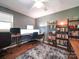 Home office featuring multiple monitors and built-in shelving at 142 Eller Rd, Gastonia, NC 28056