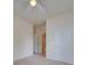 Bright bedroom with ceiling fan, carpet, and two closets at 6710 Cinnamon Cir, Mint Hill, NC 28227