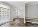 Bright dining area with hardwood floors and large windows at 230 S Tryon St # 704, Charlotte, NC 28202