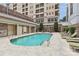 Inviting courtyard pool with comfortable lounge chairs at 230 S Tryon St # 704, Charlotte, NC 28202