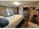 Relaxing bedroom with a queen bed and decorative accents at 280 Deerfield Estates Ln, Stony Point, NC 28678
