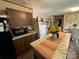 Bright kitchen featuring an island and granite countertops at 280 Deerfield Estates Ln, Stony Point, NC 28678