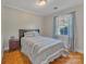 Bedroom with hardwood floors and a double bed at 5220 Seacroft Rd, Charlotte, NC 28210