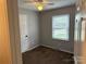 Bedroom with gray walls, brown carpet, and a ceiling fan at 2307 Dallas Stanley Hwy, Stanley, NC 28164