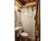 Small bathroom with shower and wood details at 902 Coldwater Ct, Concord, NC 28025