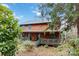 Log home with wrap-around porch, offering a charming and peaceful atmosphere at 902 Coldwater Ct, Concord, NC 28025
