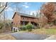 Two-story log home with attached garage and a private driveway at 902 Coldwater Ct, Concord, NC 28025