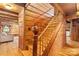 Wooden staircase connecting the first and second floors of the home at 902 Coldwater Ct, Concord, NC 28025