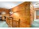 Upstairs hallway with built-in shelving and wooden walls at 902 Coldwater Ct, Concord, NC 28025