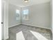 Well-lit bedroom with neutral walls and plush carpeting at 5009 Heathland Dr # 63, Charlotte, NC 28215