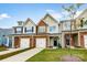 Luxury townhomes with attached garages and landscaping at 6271 Culbert St # 145, Harrisburg, NC 28075