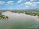 Aerial view of a peaceful lake with houses and boats at 3806 Steve Ikerd Ne Dr, Hickory, NC 28601