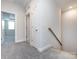 Upstairs hallway with carpet and access to bedrooms and closets at 2642 Roseglen Ln, Indian Land, SC 29707