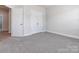 Bedroom with double door closet and grey carpet at 2642 Roseglen Ln, Indian Land, SC 29707