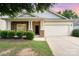 Attractive house exterior with stone and vinyl siding at 14613 Glenduff Pl, Charlotte, NC 28278