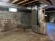 Unfinished basement with HVAC unit and ductwork at 1701 W A St, Kannapolis, NC 28081