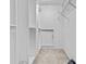 Ample walk-in closet with shelving and hanging rods at 1720 12Th Ne St, Hickory, NC 28601