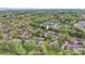Aerial view showing home's location in a wooded community at 1720 12Th Ne St, Hickory, NC 28601