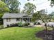 Ranch home with covered porch and landscaping at 12136 Renee Ford Rd, Stanfield, NC 28163