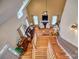 Upstairs view of the living room showcasing the hardwood floors and fireplace at 1602 Huntmoor Dr, Rock Hill, SC 29732