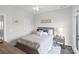 Cozy bedroom with a full-size bed and a ceiling fan at 12119 Brooklyn Ave, Charlotte, NC 28204