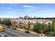 Building exterior with ample parking and city views at 12119 Brooklyn Ave, Charlotte, NC 28204