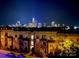 Night view of the city skyline from a condo building at 12119 Brooklyn Ave, Charlotte, NC 28204