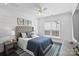 Spacious bedroom with a large bed, a TV, and neutral decor at 12119 Brooklyn Ave, Charlotte, NC 28204