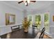 Dining room with large windows and pond view at 15610 Youngblood Rd, Charlotte, NC 28278