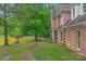 Brick home with pond views and a canoe at 15610 Youngblood Rd, Charlotte, NC 28278