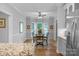 Bright dining room features a built-in window seat and hardwood floors at 15610 Youngblood Rd, Charlotte, NC 28278