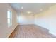 Spacious bonus room with carpeted floors and large windows at 1813 Augustine St, Monroe, NC 28112