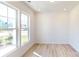 Spacious office with large windows and hardwood floors at 1813 Augustine St, Monroe, NC 28112