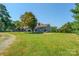 Ranch home with a large grassy front yard at 5625 Highway 601 Hwy, Salisbury, NC 28147