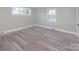 Spacious bedroom with grey walls and wood-look vinyl flooring at 5625 Highway 601 Hwy, Salisbury, NC 28147
