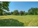 Large backyard with mature trees and a barn at 5625 Highway 601 Hwy, Salisbury, NC 28147