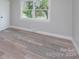 Well-lit bedroom featuring vinyl flooring and neutral walls at 5625 Highway 601 Hwy, Salisbury, NC 28147