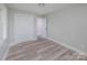 Bedroom with double door closet and wood-look floors at 5625 Highway 601 Hwy, Salisbury, NC 28147