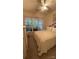 Bright bedroom with a queen-size bed and large windows at 12111 Frogs Leap Ct, Charlotte, NC 28277