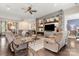 Open living area with stone fireplace and built-in shelving at 15814 Vale Ridge Dr, Charlotte, NC 28278
