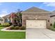 Brick ranch house with 2-car garage and landscaping at 15814 Vale Ridge Dr, Charlotte, NC 28278